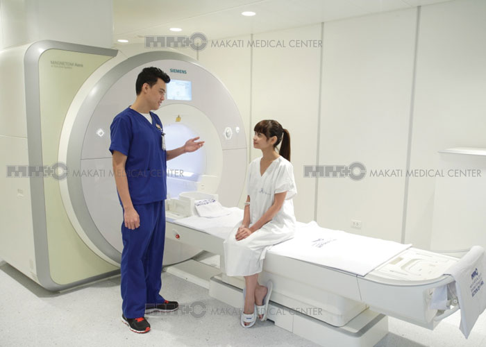 radiology staff talking to a patient