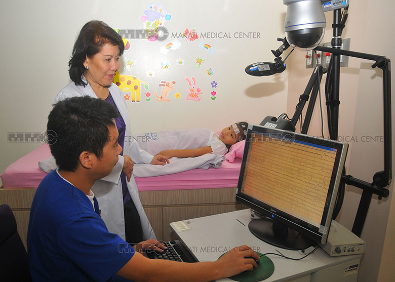 neuroscience doctor checking a kid patient