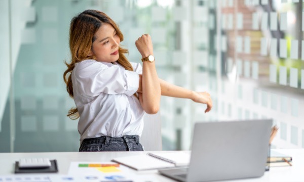 working woman stretching